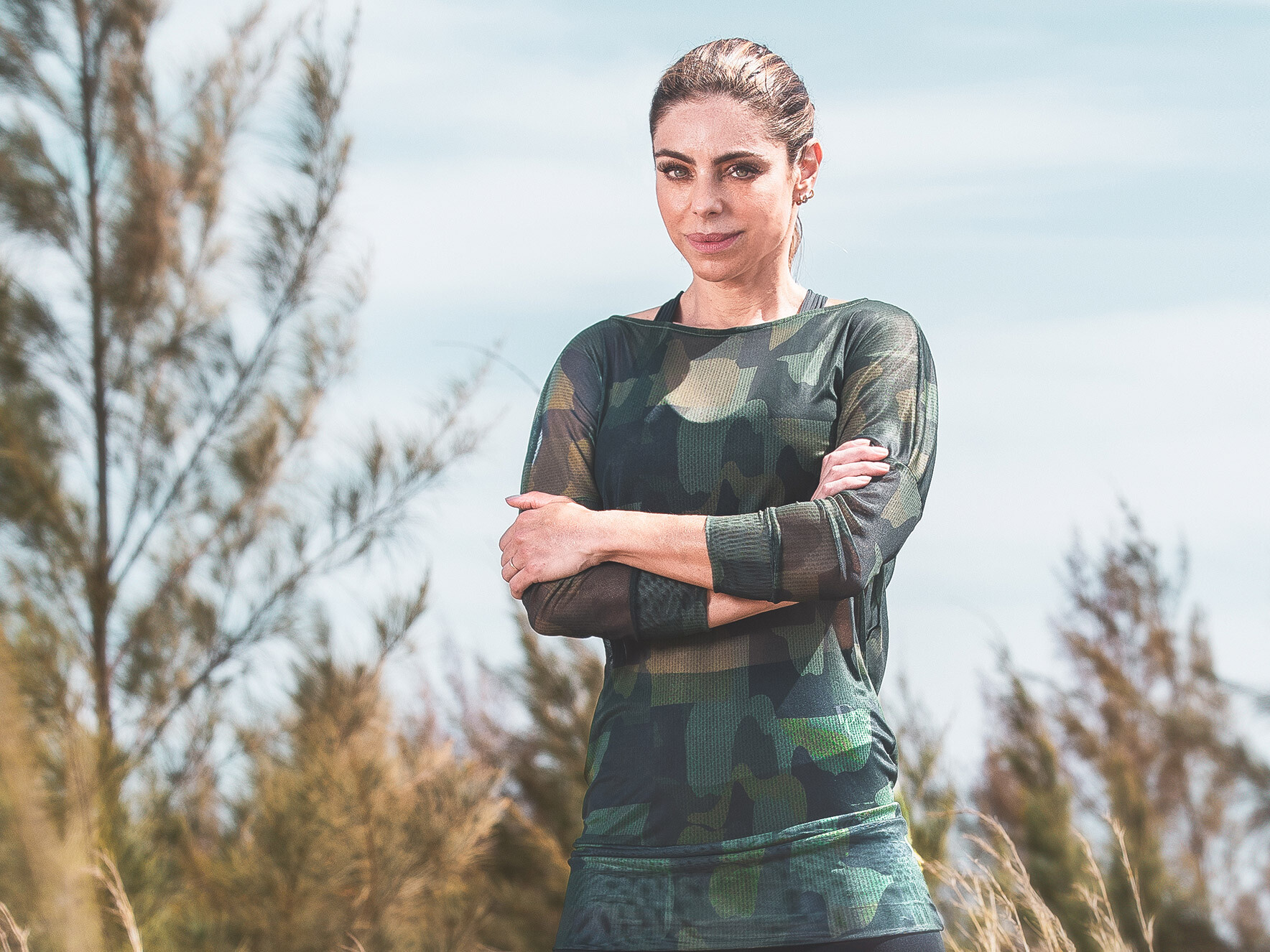 Danielle Cicarelli com roupa fitness estampa camuflada